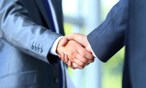 26278386 - two businessman shaking hands