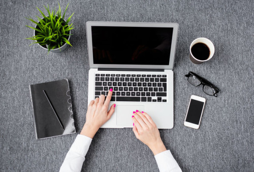 37177040 - young professional woman working with computer